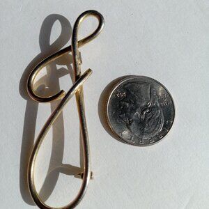 This little brooch is unsigned but very good quality vintage costume jewelry. Da